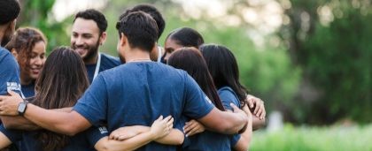 Group of people hugging